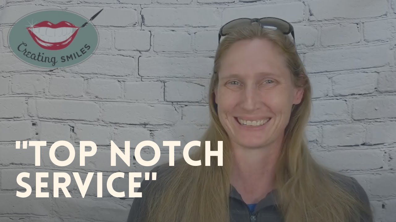 Woman smiling at camera in front of white brick wall with "Top Notch Service" text overlay.