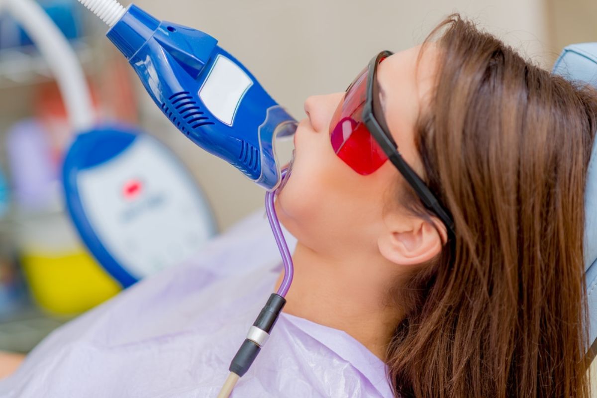 Woman getting in-office teeth whitening
